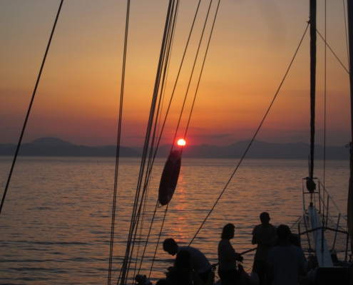 Bluecruise,Sunset.Cheers Yachting